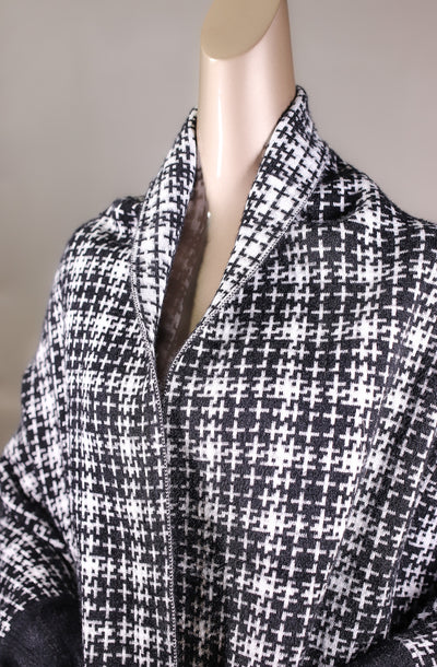 Cross-Patterned Cape with Fox and Cable-Knitted Trimming