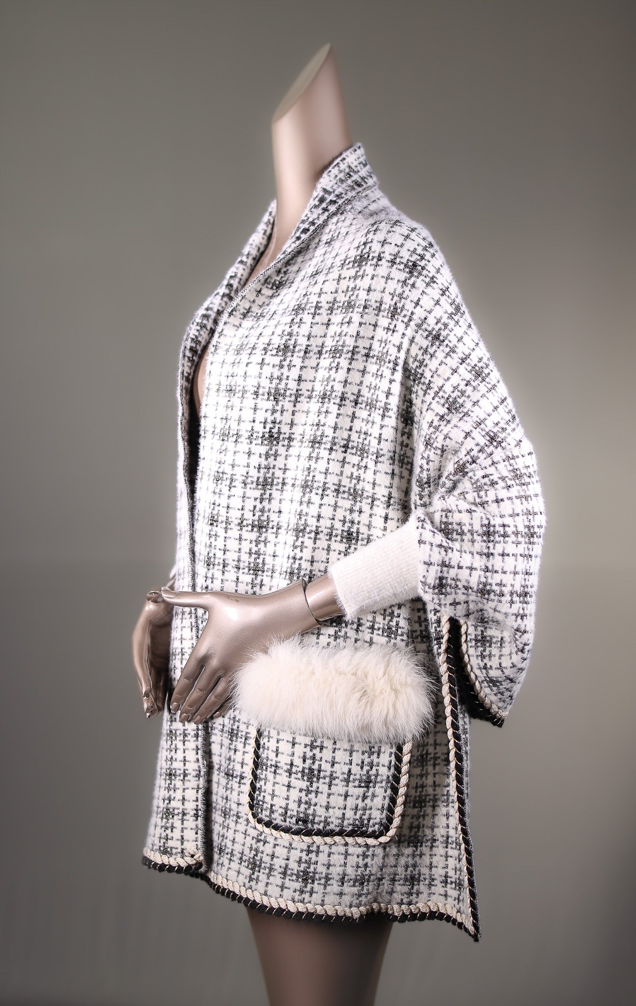 Cross-Patterned Cape with Fox and Cable-Knitted Trimming