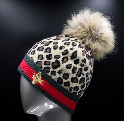 Knitted Leopard-Printed Wool Hat with Finn Raccoon Pom-Pom