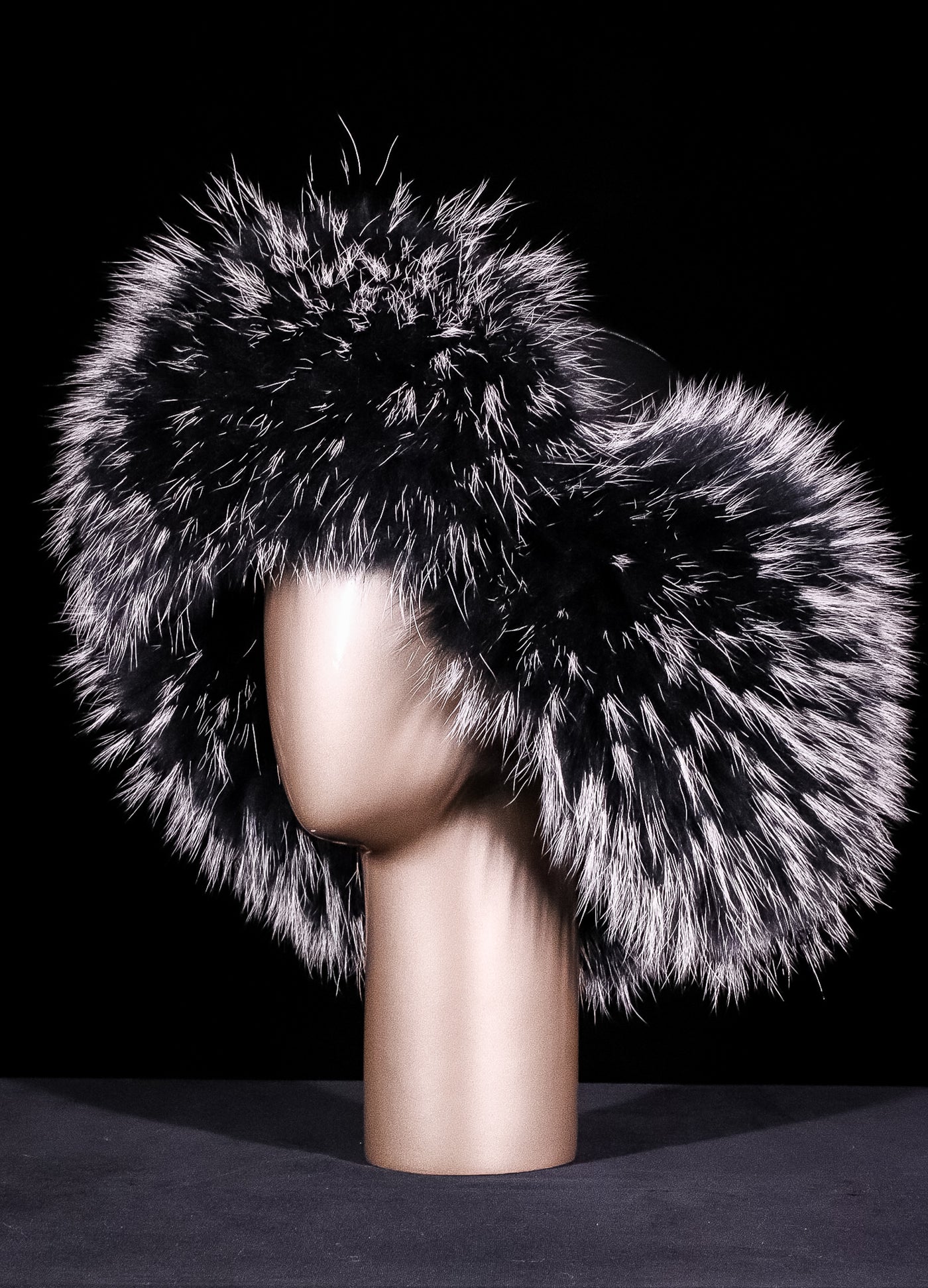 Italian Lamb Leather Musher Hat with Finn Raccoon Trim and Pom-Poms