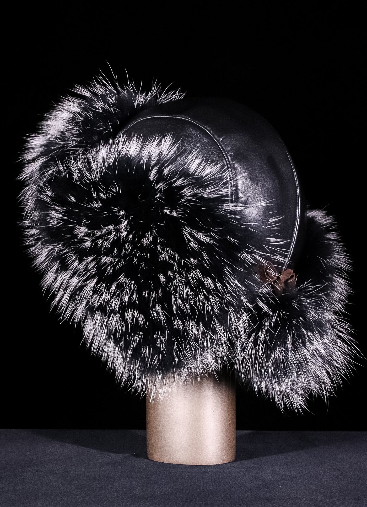 Italian Lamb Leather Musher Hat with Finn Raccoon Trim and Pom-Poms